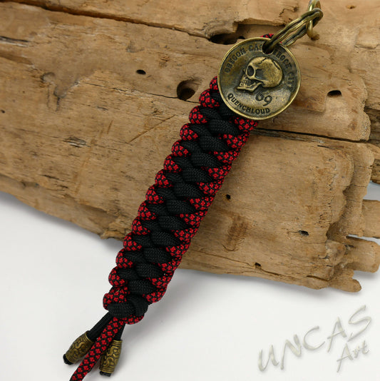 Paracord 550 Schlüsselanhänger Totenkopf Münze - diamond rot / schwarz