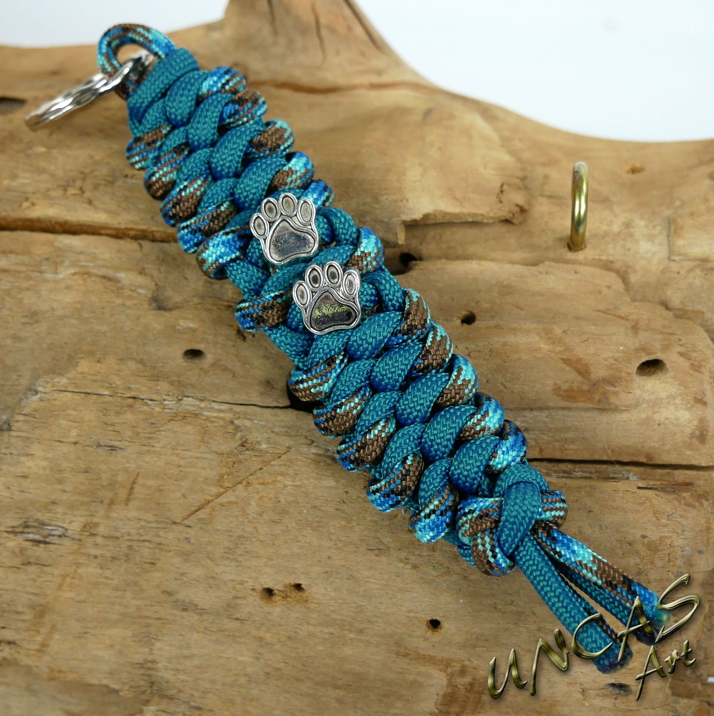 Paracord Schlüsselanhänger PFOTE abyss türkis blau teal
