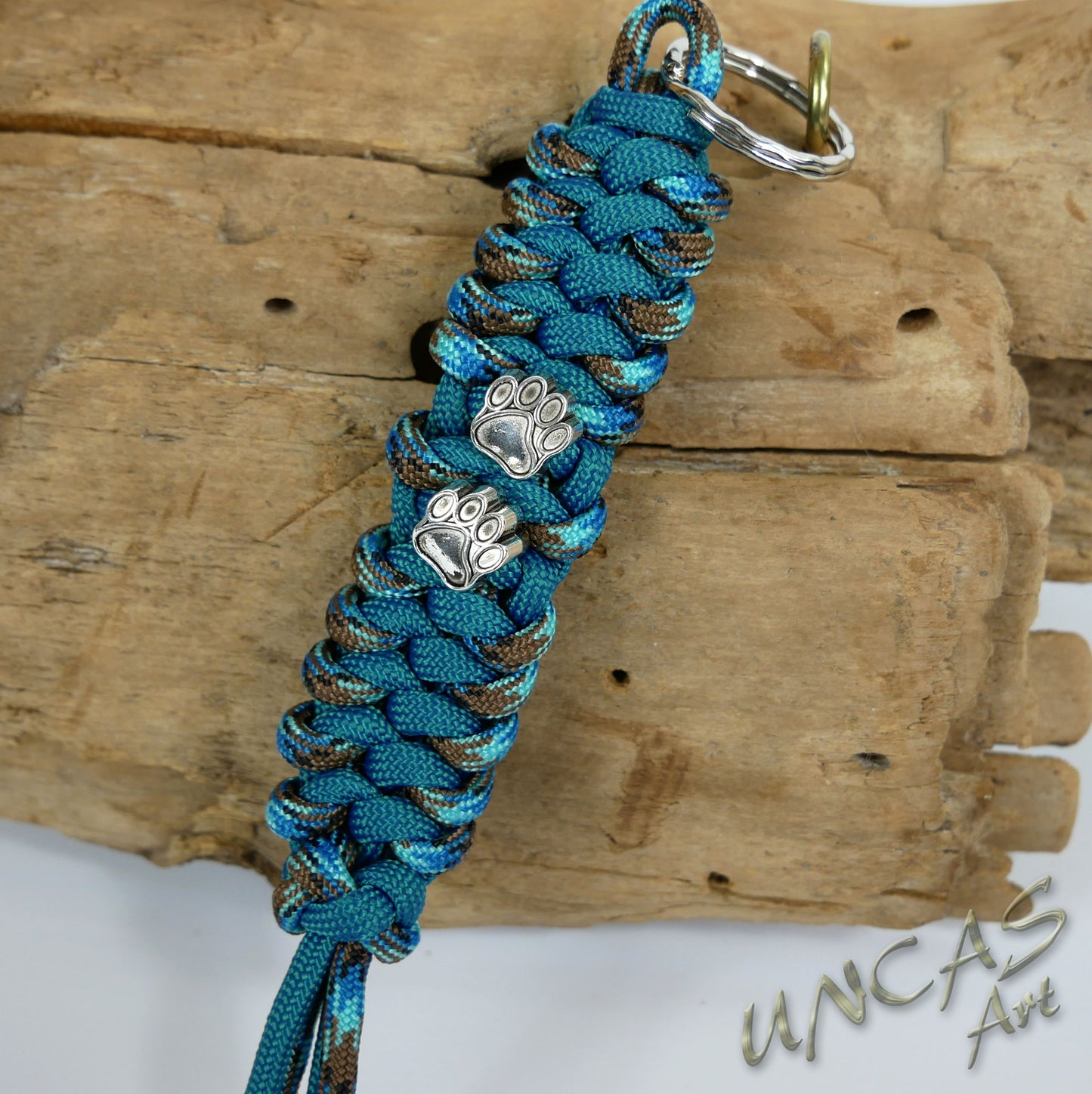 Paracord Schlüsselanhänger PFOTE abyss türkis blau teal