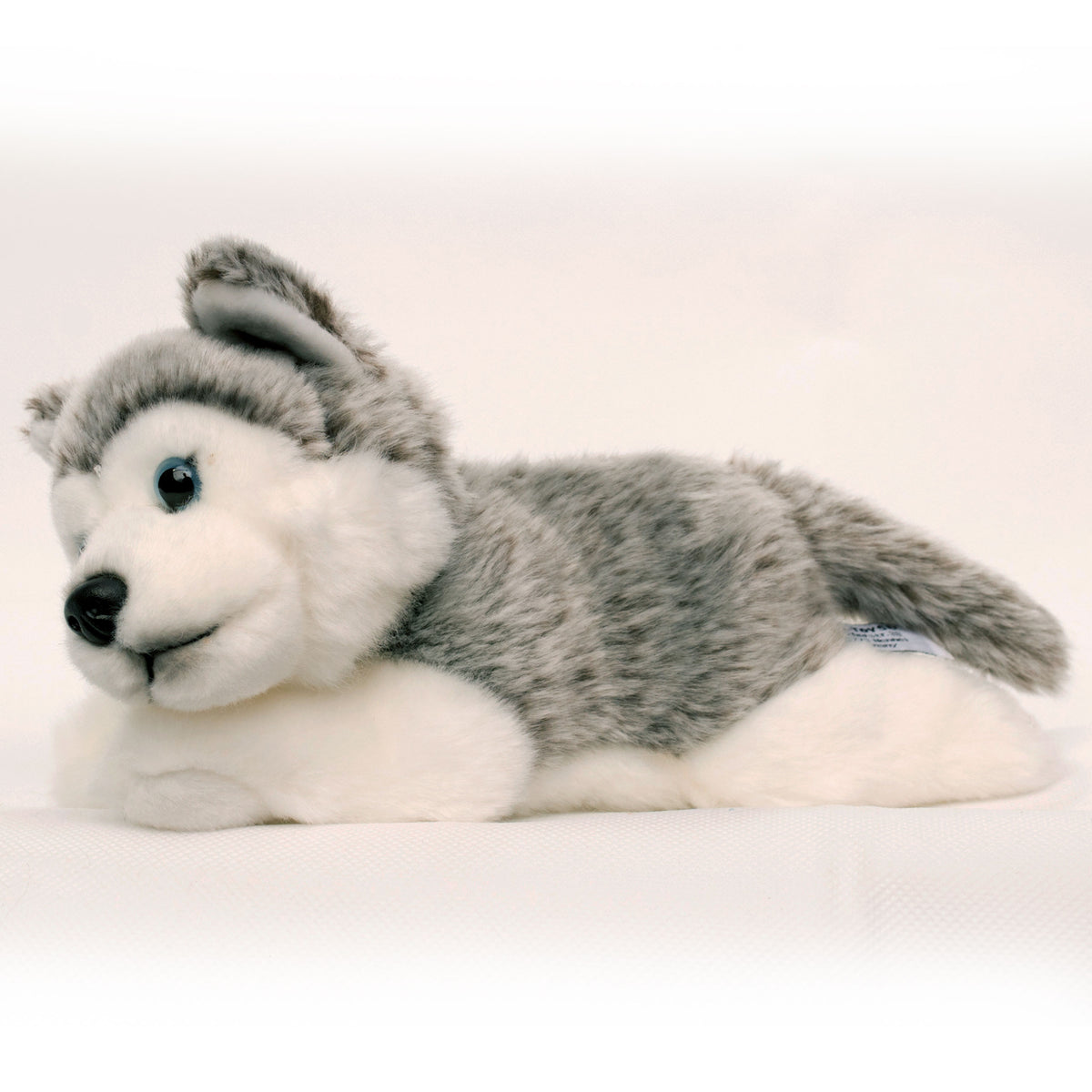 Husky Kuscheltier Welpe liegend Plüsch Hund