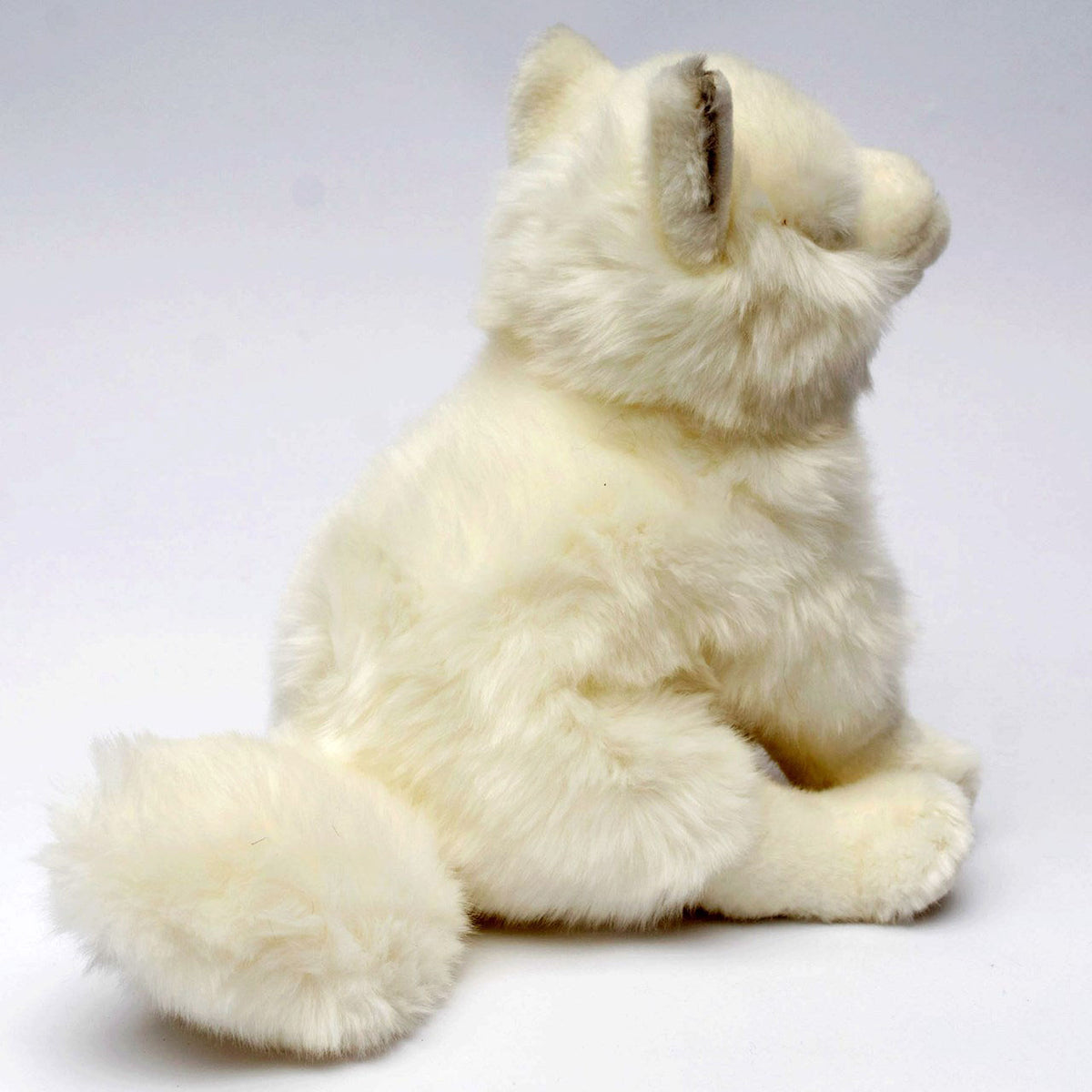 UNI-TOYS weißer Wolf sitzend Kuscheltier 24 cm hoch Plüschtier