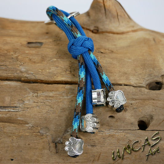 Paracord Schlüsselanhänger 4 Pfoten teal / abyss türkis