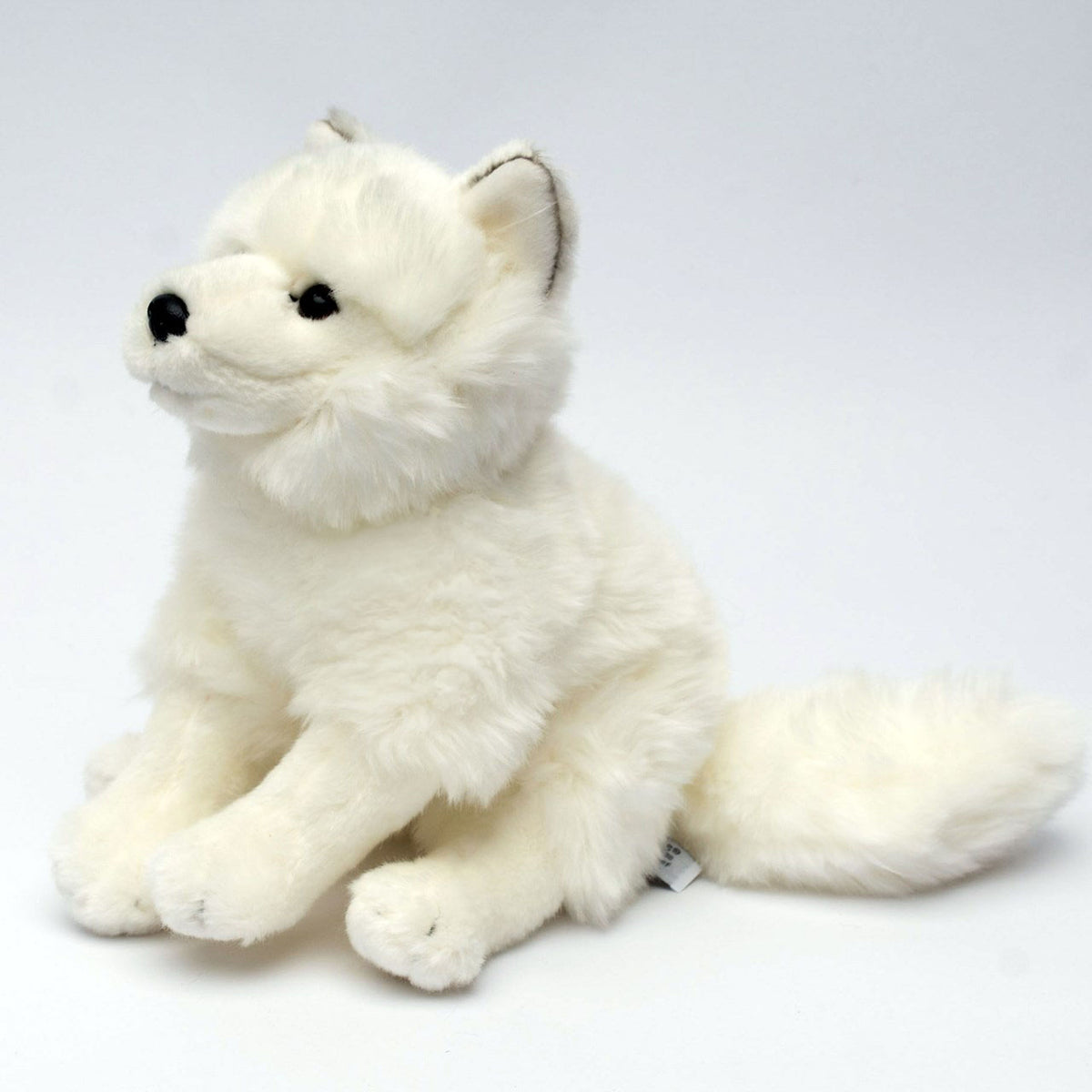 UNI-TOYS weißer Wolf sitzend Kuscheltier 24 cm hoch Plüschtier