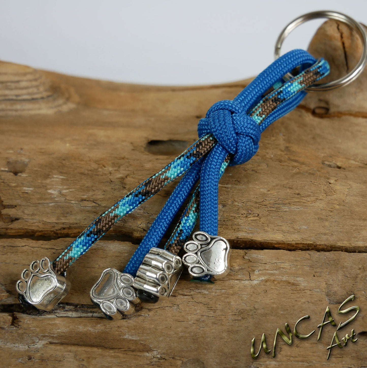 Paracord Schlüsselanhänger 4 Pfoten teal / abyss türkis