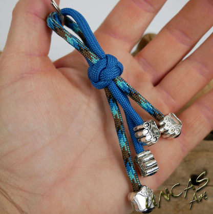 Paracord Schlüsselanhänger 4 Pfoten teal / abyss türkis