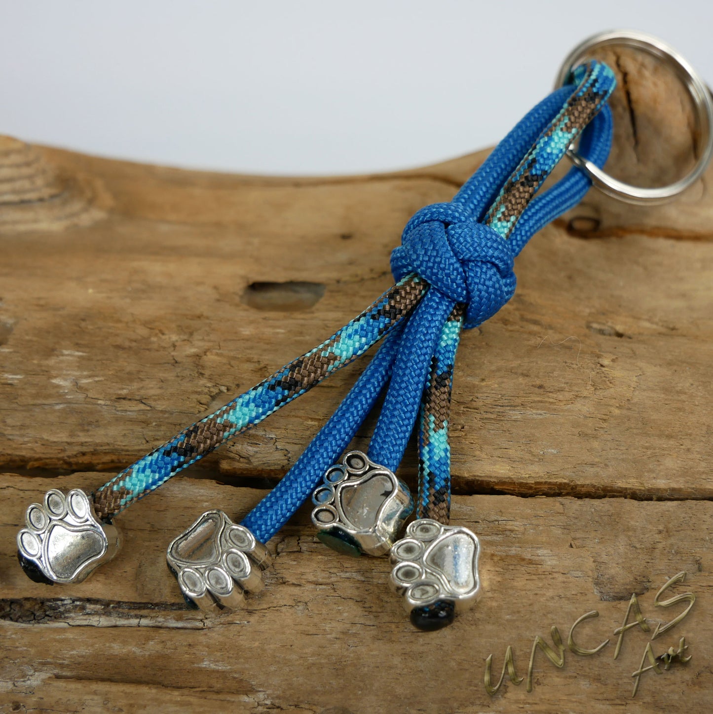 Paracord Schlüsselanhänger 4 Pfoten teal / abyss türkis